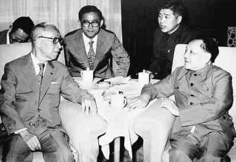 Deng meets with Matsushita on the latter’s first visit to China.