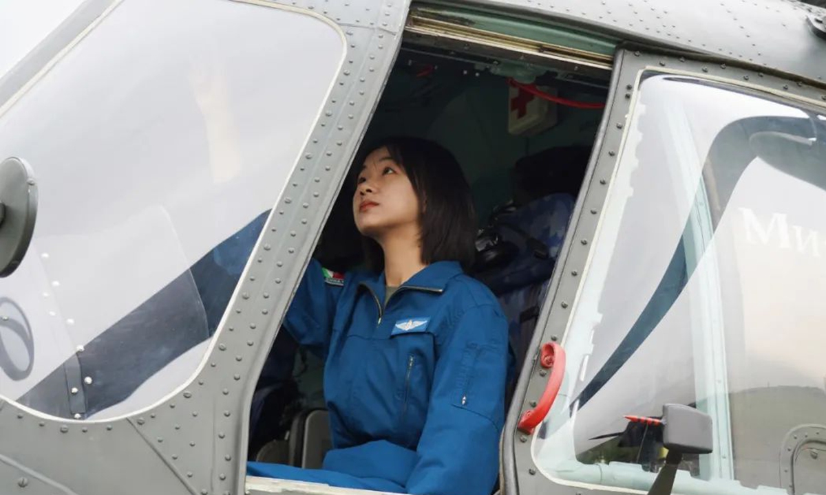 PLA Western Theater Command on Thursday, the 77th Group Army has welcomed two fresh graduated female helicopter pilots Han Jianing and Chen Tianchang in the team, where their pictures in pilots suits are also published. Picture of Han Jianing Photo: Web
